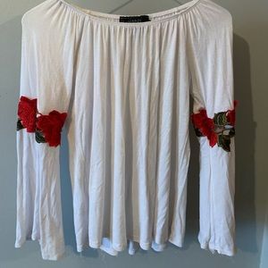 White off the shoulder top with rose detailing